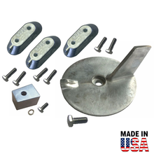 Metal components including a large circular piece, smaller metal pieces, and screws on a white background with 'Made in USA' text.